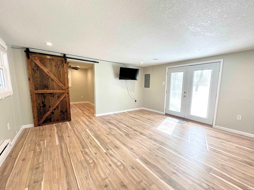 NO PROJECTS NEEDED! FULL RENO! This Irish Lake cottage is - photo 9
