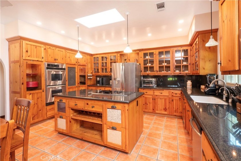 Welcome to this highly desirable single-story estate featuring a - photo 6