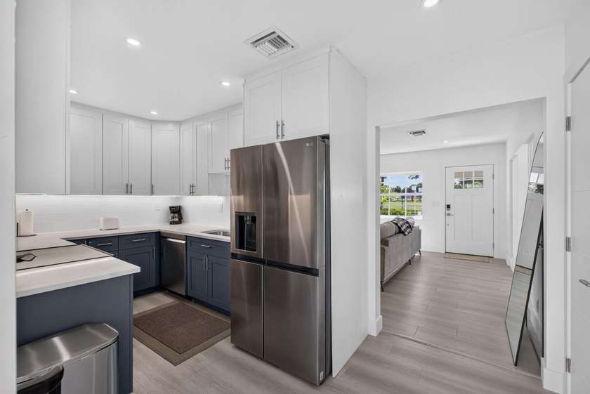Completely rebuilt 4BR/3BA home featuring a major renovation - photo 11