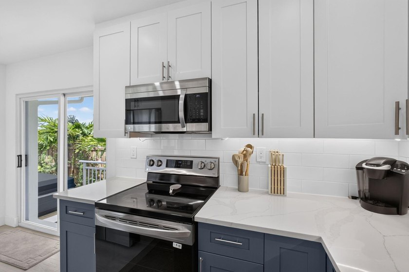 Completely rebuilt 4BR/3BA home featuring a major renovation - photo 13