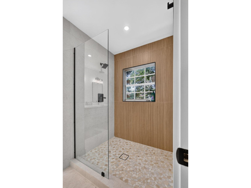 Completely rebuilt 4BR/3BA home featuring a major renovation - photo 17