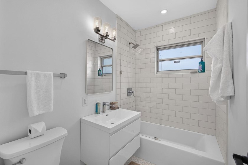 Completely rebuilt 4BR/3BA home featuring a major renovation - photo 28