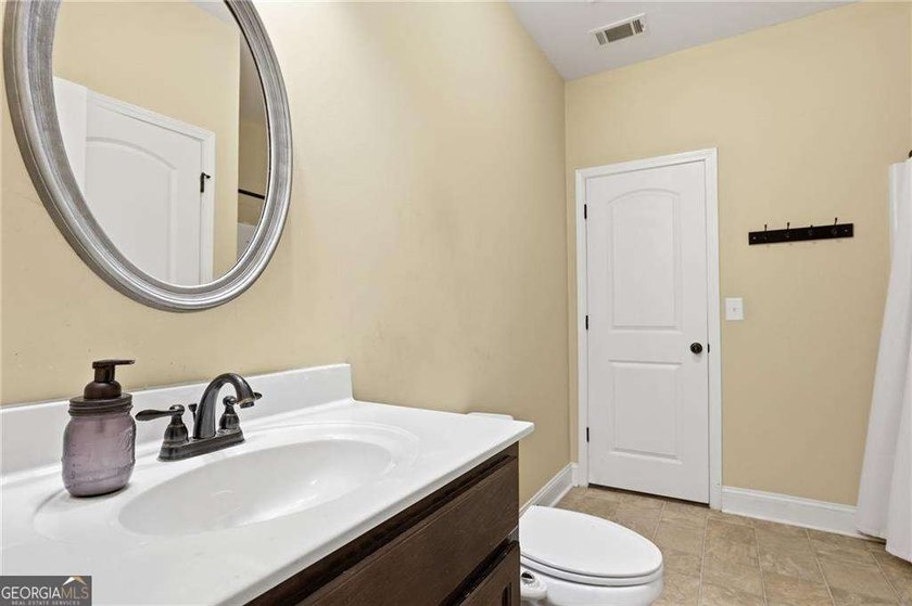 Nestled on a private lot in the quiet Lake Allatoona community - photo 33