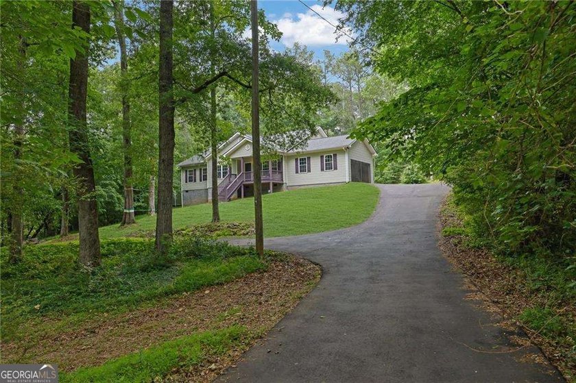 Nestled on a private lot in the quiet Lake Allatoona community - photo 41