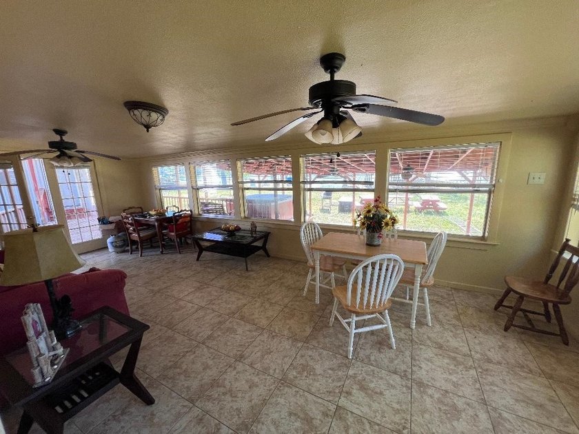 Two deeded waterfront lots on Lake Murvaul. Two homes. The - photo 11