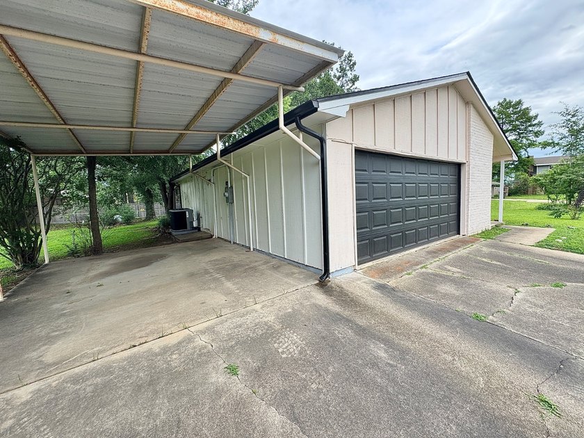 Welcome to this solidly built 3-bedroom, 2-bath home nestled on - photo 4