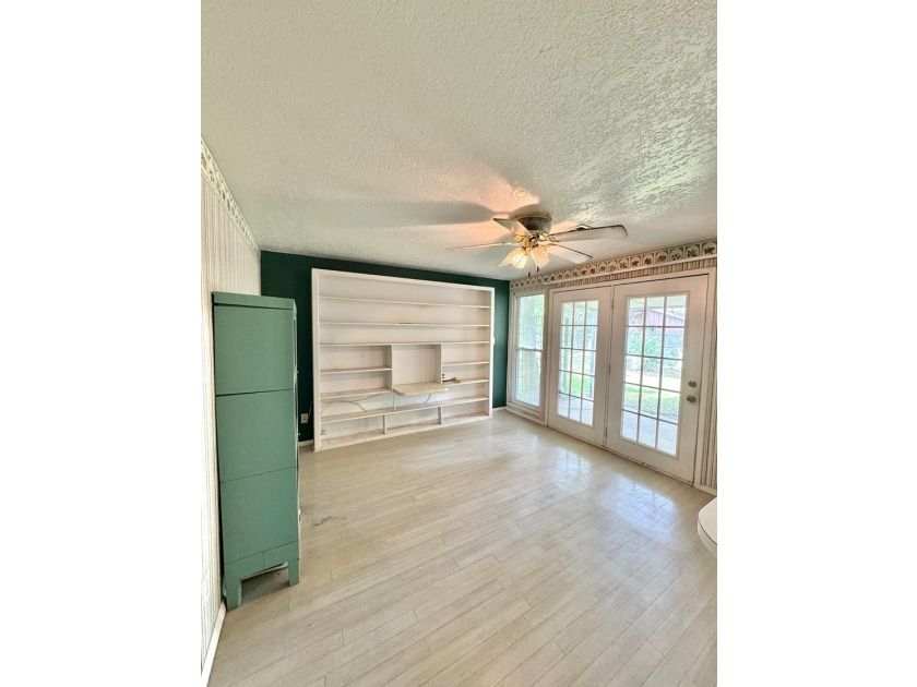 Welcome to this solidly built 3-bedroom, 2-bath home nestled on - photo 8