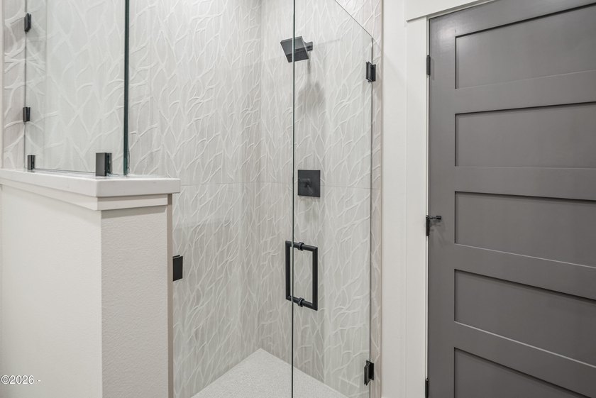 Just completed new construction, this modern residence blends - photo 30