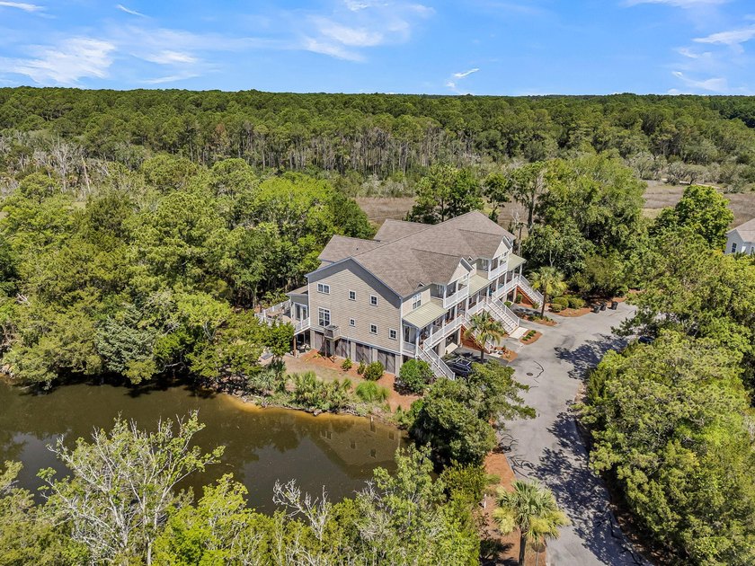 Nestled within the sought-after Retreat at Charleston National - photo 3