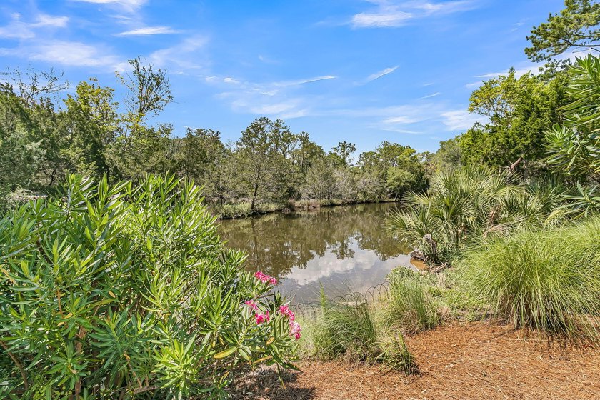 Nestled within the sought-after Retreat at Charleston National - photo 6