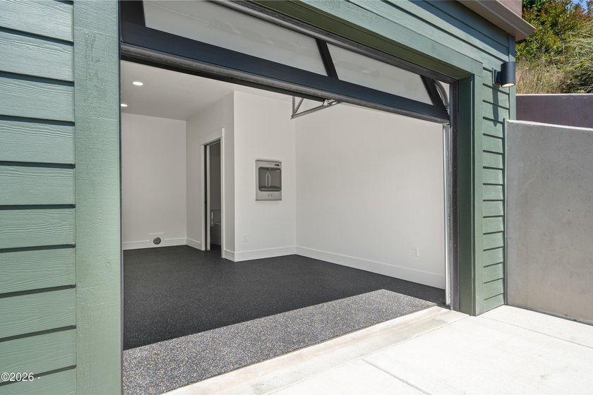 Just completed new construction, this modern residence blends - photo 38
