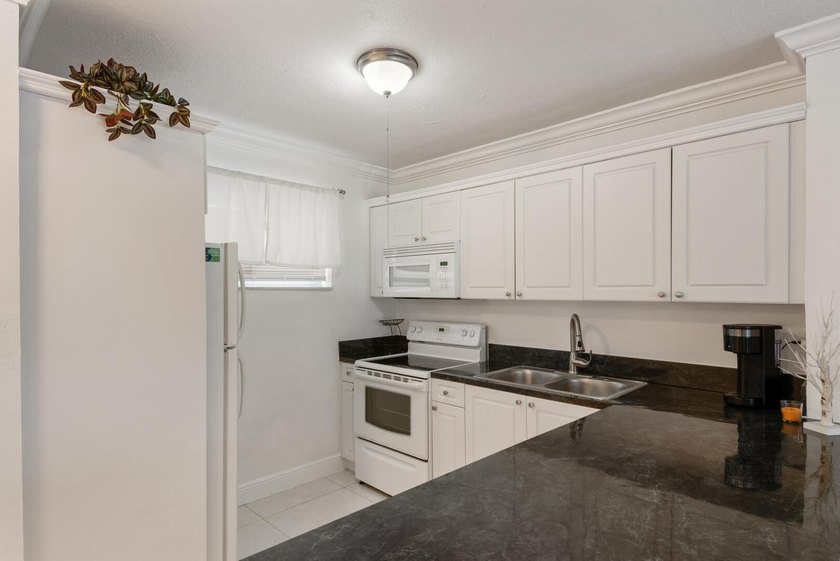 Welcome to 2581 N Garden Drive, Unit 206, a beautifully updated - photo 7