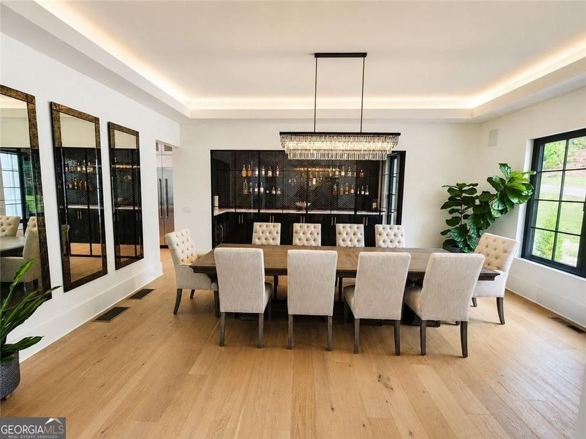 Beautiful, prime golf course and lake views set the stage for - photo 12