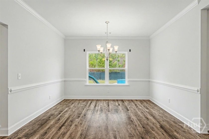 Step into a home that blends comfort, space, and connection to - photo 12