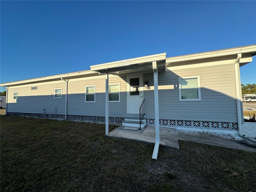 Welcome to Holiday Park! This turn-key furnished LAND-OWNED - photo 2