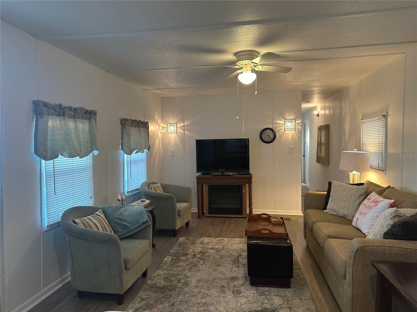Welcome to Holiday Park! This turn-key furnished LAND-OWNED - photo 7