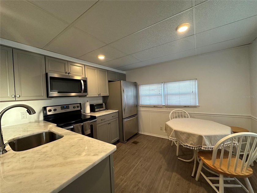 Welcome to Holiday Park! This turn-key furnished LAND-OWNED - photo 10