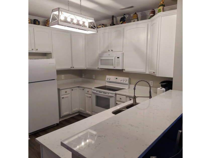 Enjoy the best of Folly Beach living at Marsh Winds, where you - photo 10