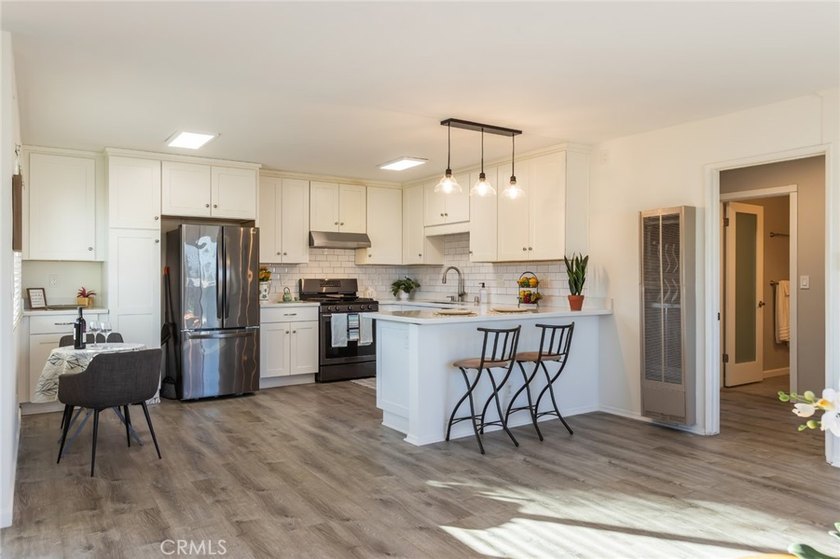 Welcome home to this rare and beautifully remodeled 2-bedroom - photo 8