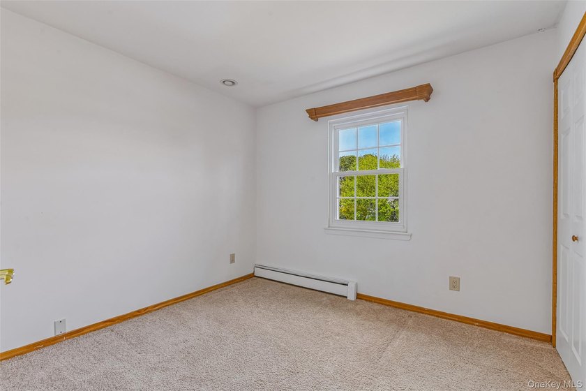 Spacious Colonial In East Patchogue Awaits! This 9-room Colonial - photo 26