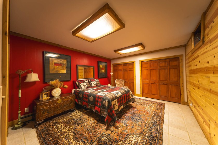 This 4-bedroom, 2.5-bath, 3,696-square-foot home sits on 21 - photo 15