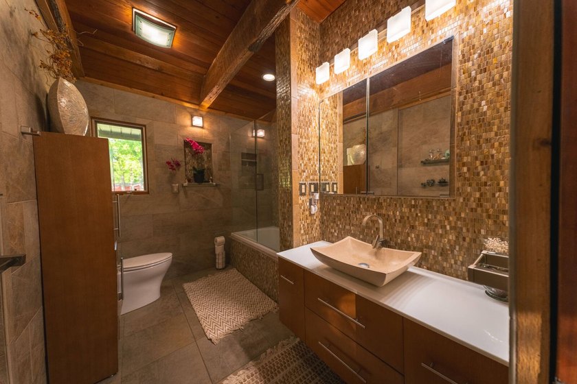 This 4-bedroom, 2.5-bath, 3,696-square-foot home sits on 21 - photo 18
