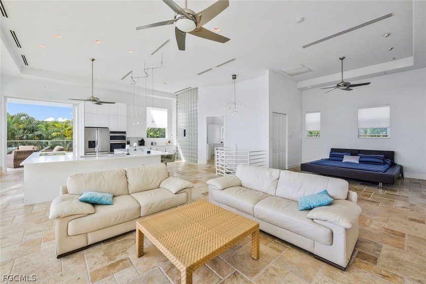 Discover this unique and elegant 2-story waterfront mansion in - photo 33