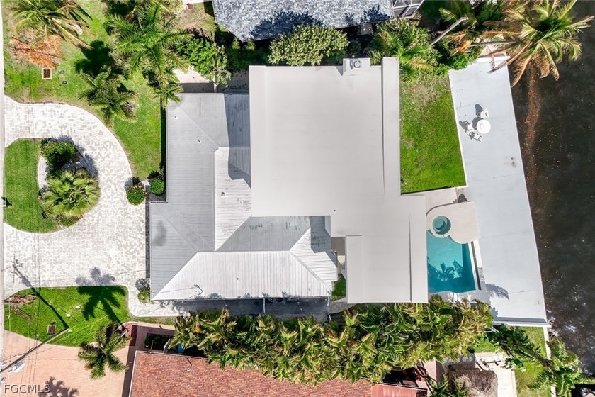 Discover this unique and elegant 2-story waterfront mansion in - photo 50