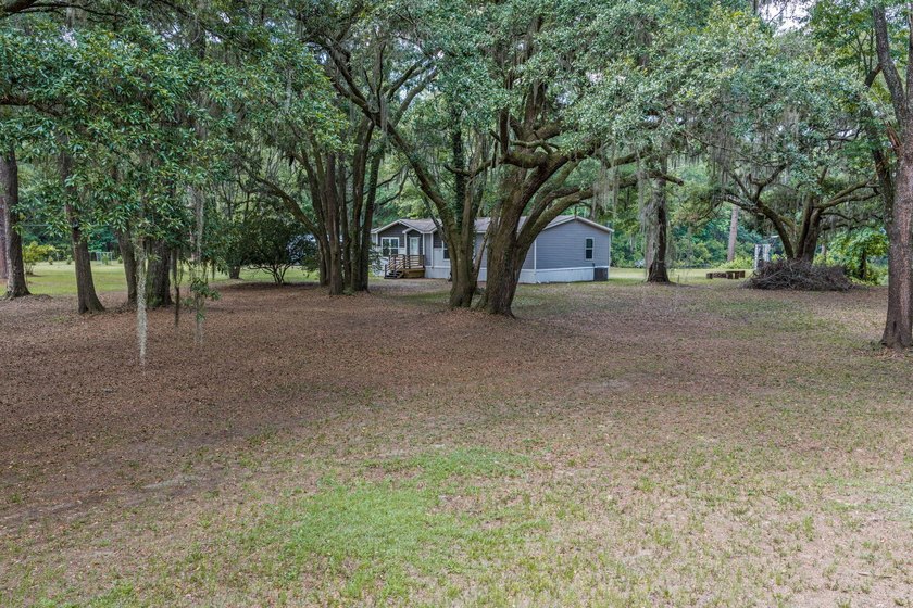 6.19 Acres | Approx. 3-Acre Private Freshwater Lake | 3BR | 2BA - photo 9