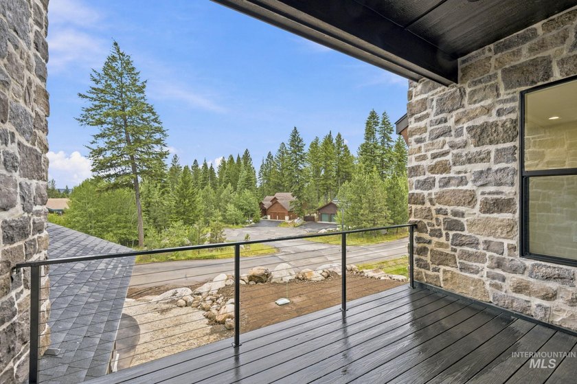 Nestled on a private, majestic wooded lot, this exquisite - photo 11