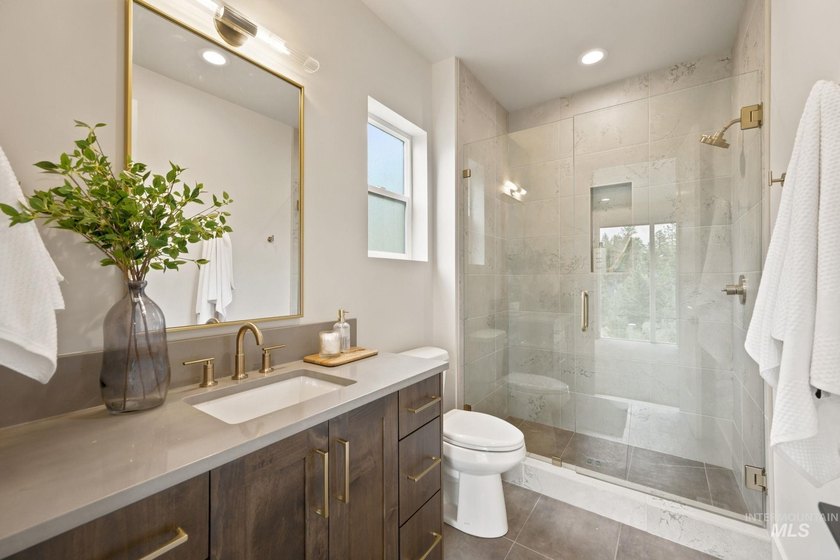 Nestled on a private, majestic wooded lot, this exquisite - photo 13