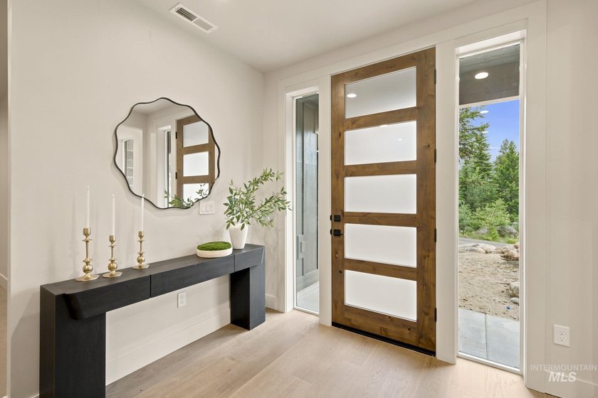Nestled on a private, majestic wooded lot, this exquisite - photo 18