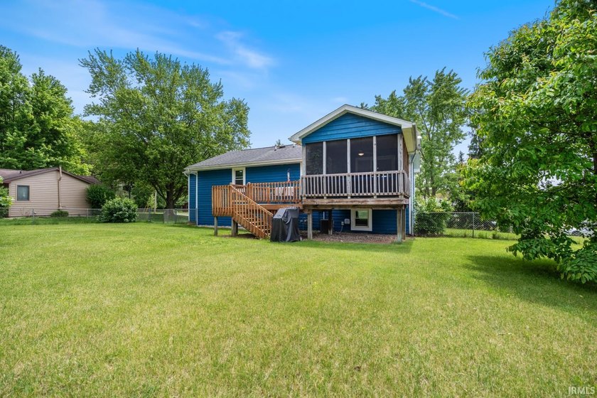 Step inside this beautifully updated split-level home where - photo 3