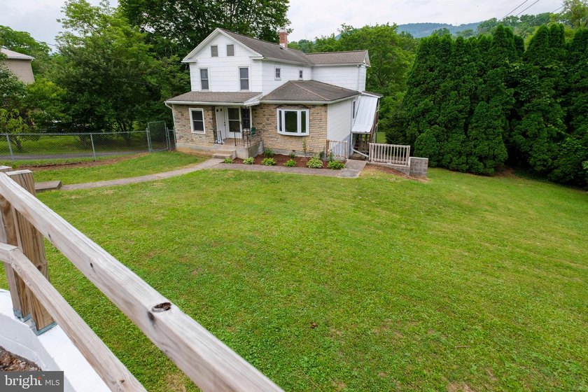 Imagine having 117 feet of frontage along renowned Spring Creek - photo 2