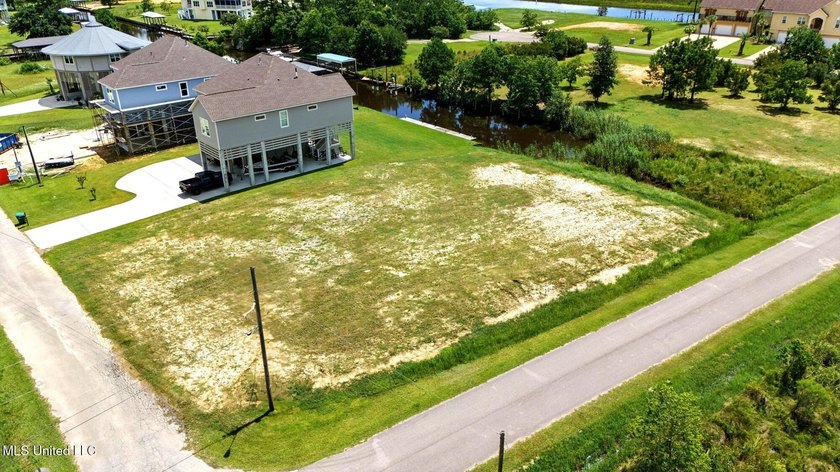 WATERFRONT LOT ON THE SOUTH SIDE OF DIAMONDHEAD. EASY ACCESS TO - photo 5