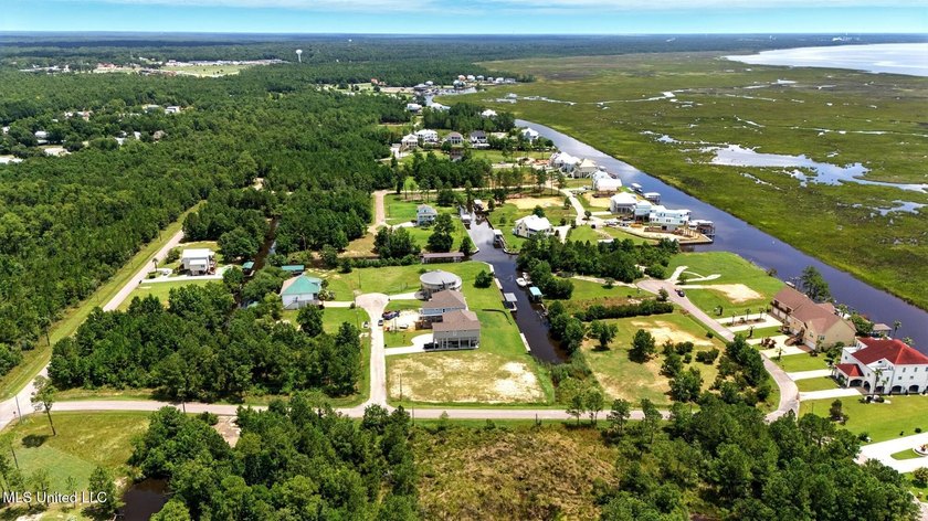 WATERFRONT LOT ON THE SOUTH SIDE OF DIAMONDHEAD. EASY ACCESS TO - photo 6