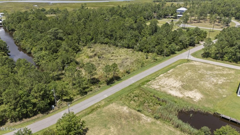 WATERFRONT LOT ON THE SOUTH SIDE OF DIAMONDHEAD. EASY ACCESS TO - photo 8