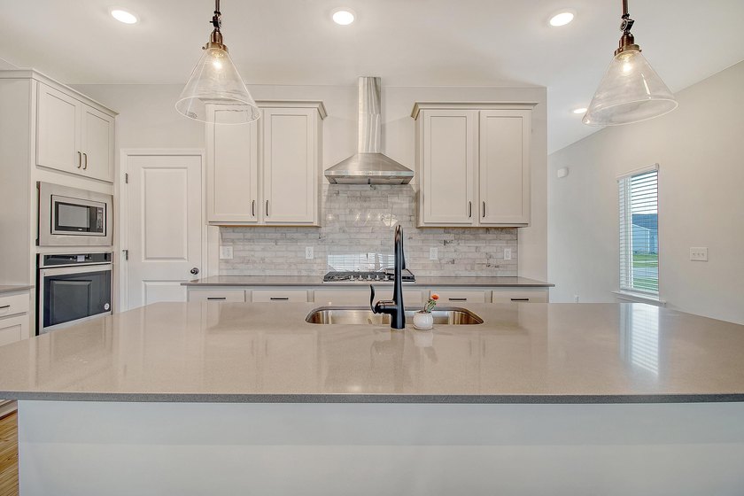 Proudly presenting this exceptional 4-bedroom, 2.5-bathroom home - photo 5