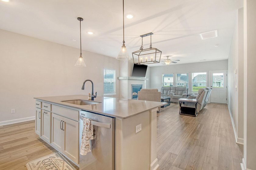Proudly presenting this exceptional 4-bedroom, 2.5-bathroom home - photo 8