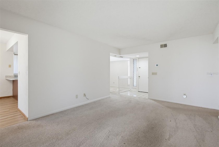 This 2 bedroom, 2 bathroom first floor condo is conveniently - photo 4