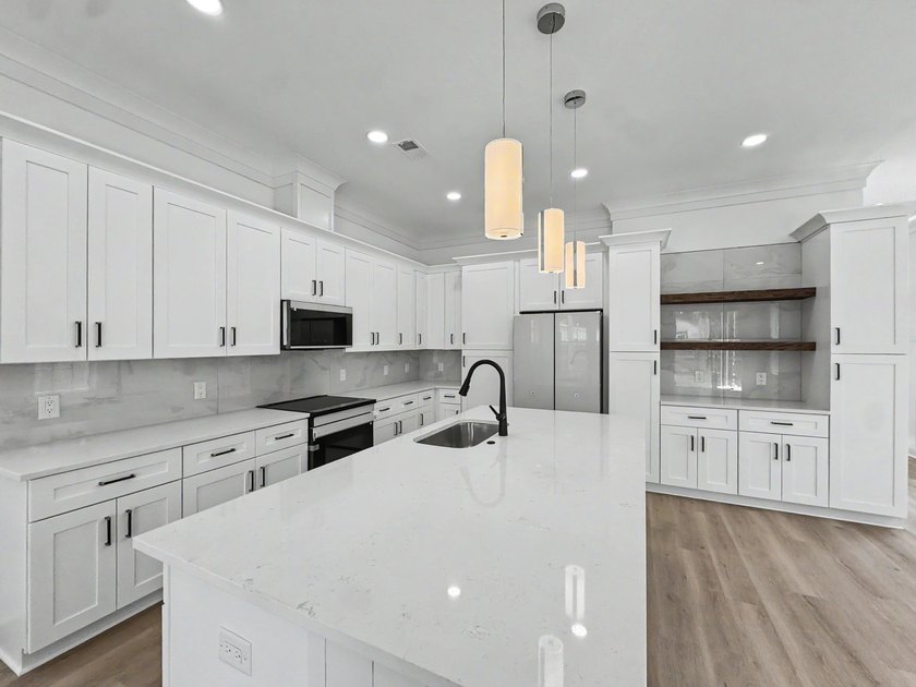 Welcome to 1988 Irving Avenue, a beautifully crafted new - photo 10