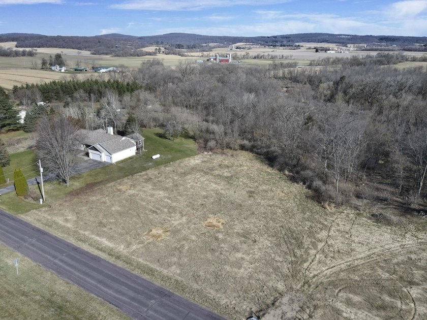 Build your dream getaway on this beautiful 1+ acre lot with - photo 3