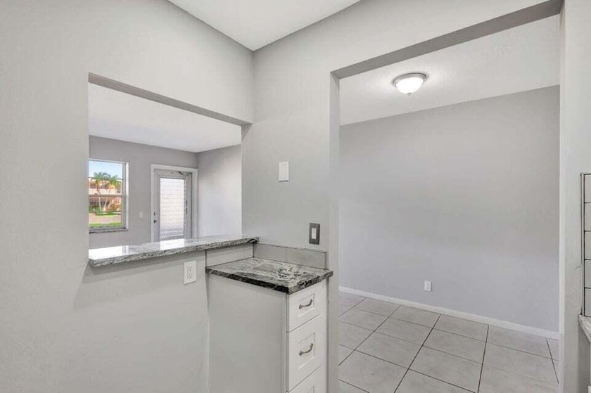 Beautifully remodeled ground floor unit in a gated 55 + - photo 4