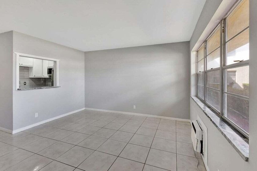 Beautifully remodeled ground floor unit in a gated 55 + - photo 9