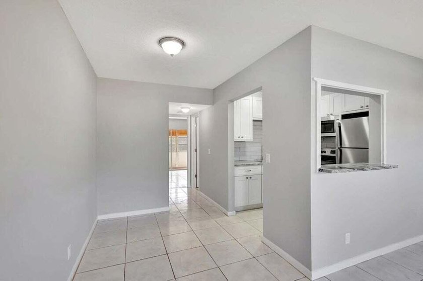 Beautifully remodeled ground floor unit in a gated 55 + - photo 10