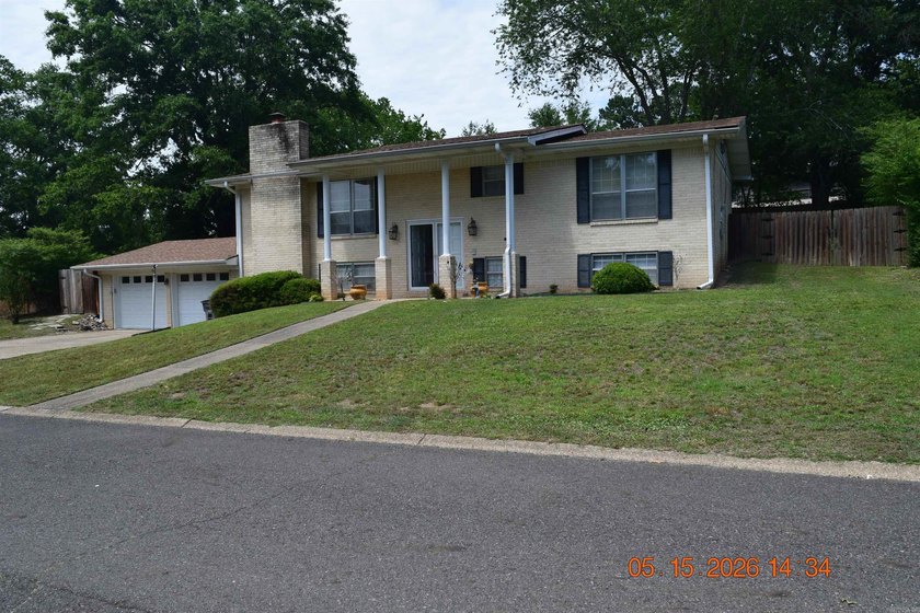 Located in the Village South Subdivision, this 5-bedroom, 3-bath - photo 2