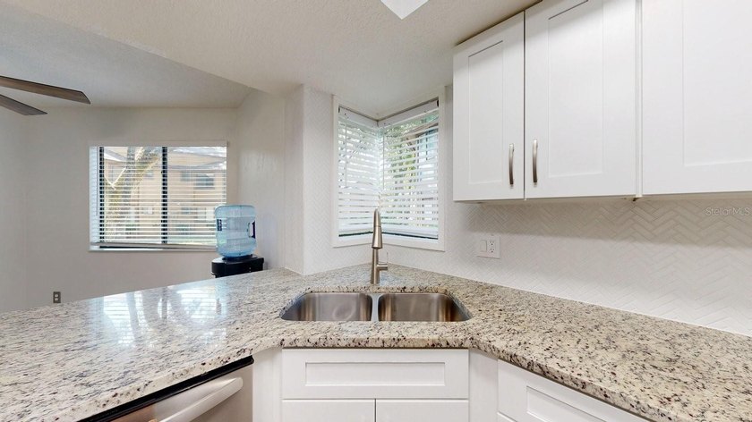 Updated ground-floor 2-bedroom, 2-bath condo offering - photo 8