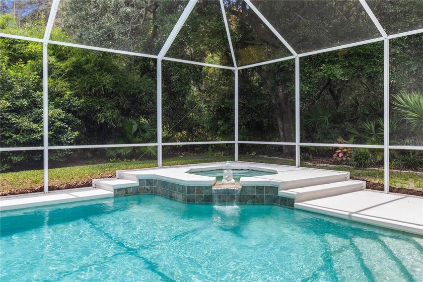 Virtually Staged. Nestled within the prestigious, guard-gated - photo 4