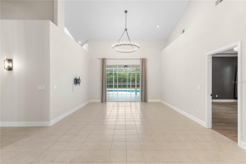 Virtually Staged. Nestled within the prestigious, guard-gated - photo 10