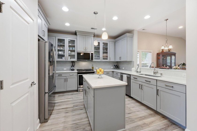 Nestled on a picturesque cul-de-sac, this exceptional, freshly - photo 6